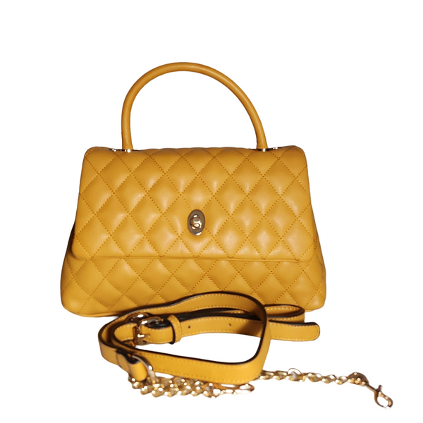 Mustard yellow quilted mini satchel handbag with structed top handle, gold-toe hardware, detachable shoulder strap.