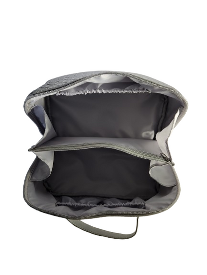 Open silver cosmetic bag showing spacious interior