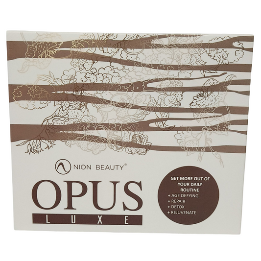 NION BEAUTY OPUS LUXE Facial Cleaner in its original white and brown floral-patterned retail box