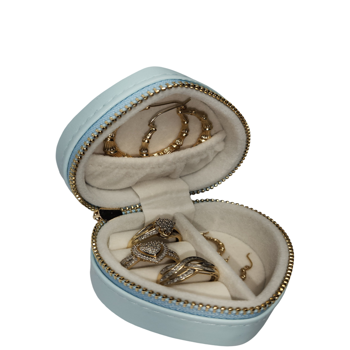 Open light blue heart-shaped jewelry organizer displaying rings and earrings in soft-lined compartments.
