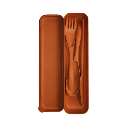 Orange reusable travel utensil set with fork, spoon, and knife in an open storage case.