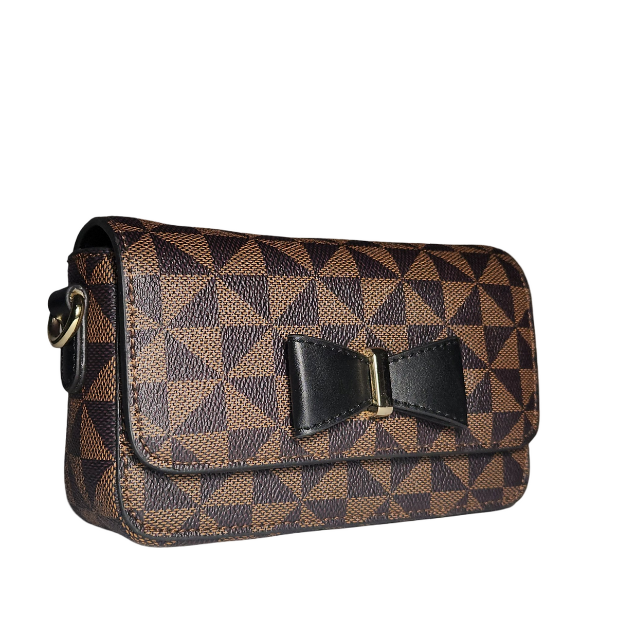 Side angle view of brown and black geometric patterned mini crossbody bag showing its structured shape, flap closure, and black bow accent.