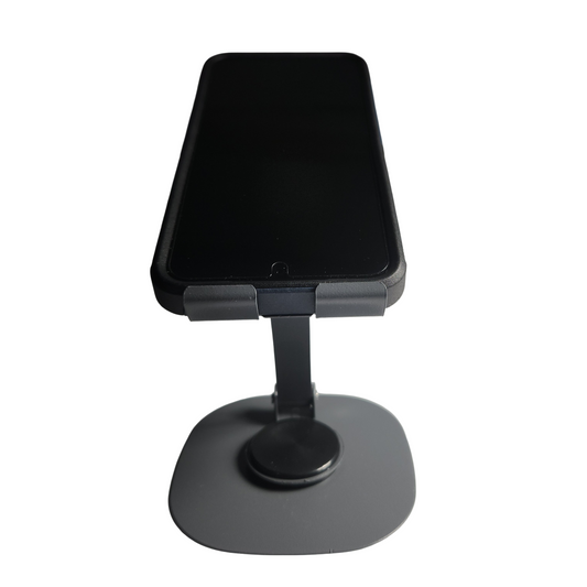Gray adjustable folding aluminum phone stand holding a smartphone in an upright position.