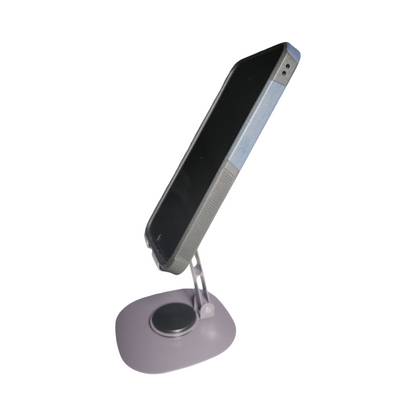 Purple adjustable folding phone stand holding a smartphone at an angled viewing position, side view showing the rotating base.