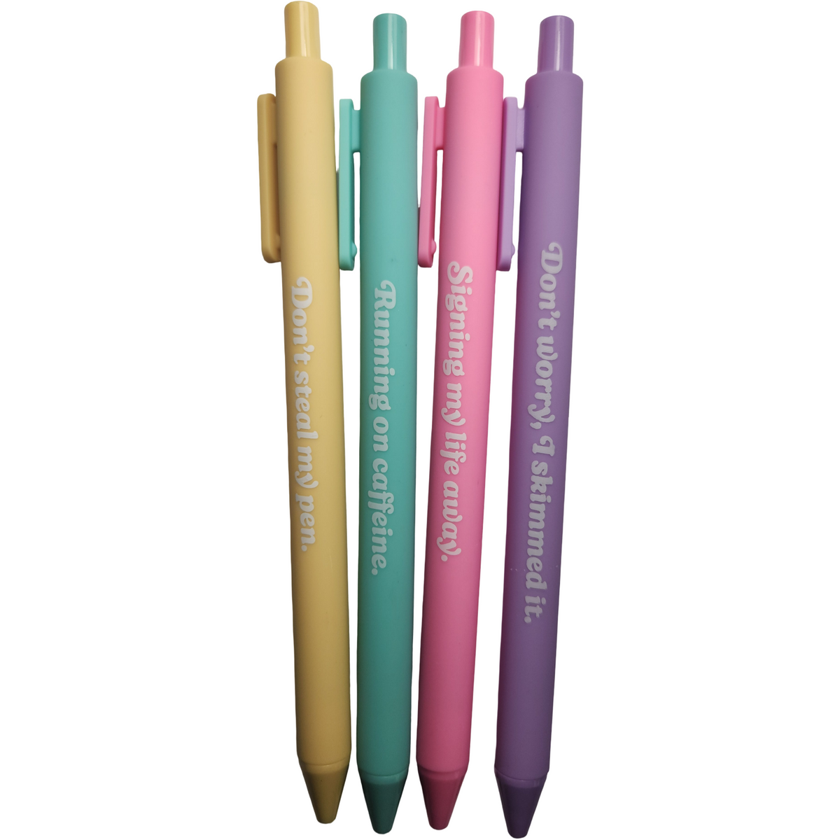 Four-piece motivational pen set in yellow, teal, pink, and purple with playful printed sayings.