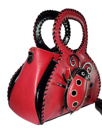 Red Diophy ladybug satchel bag angled side view
