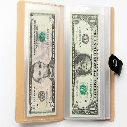 Savings challenge binder with clear cash sleeves and money