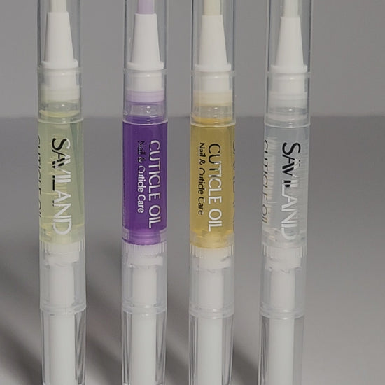 Set of four cuticle oil pens displayed together.